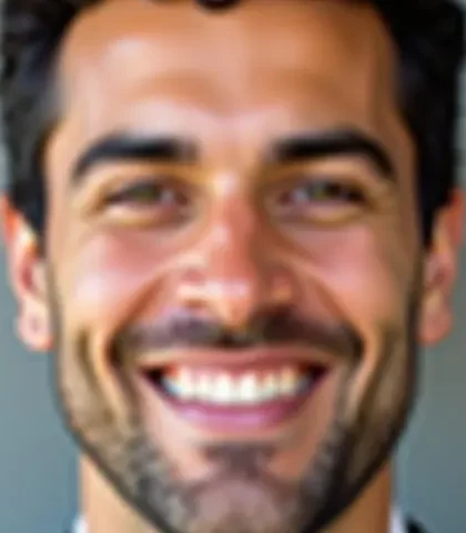 Headshot before close-up: smooth forehead, glossy nose, and softly defined smile and beard